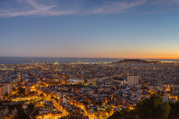 Fototapeta na wymiar The skyline of Barcelona in Spain after sunset