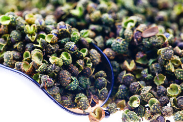 Green peppers on a white background