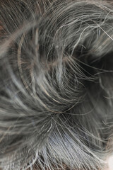 Close up of man gray hair. getting white.
