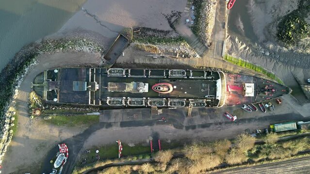 Ghost Ship the Duke of Lancaster at sunset - drone top down decend - Mostyn, Wales, UK