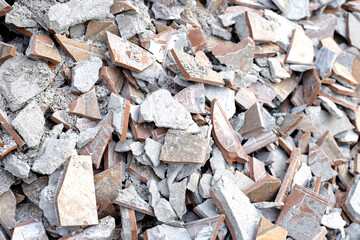 Piles of broken floor tiles from house renovations