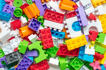Colorful plastic construction blocks Children's construction kit Educational concept   - 707654329