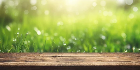 Tuinposter grass,Park blur background ,Natural textured background,Disorienting spring common establishment with green unused delightful energized grass and cleanse wooden table in nature morning open see at.  © Imran