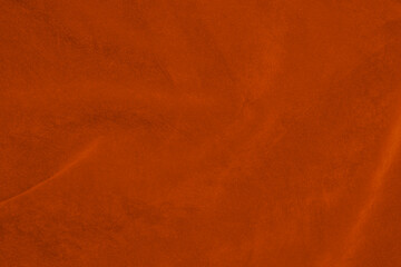 light orange velvet fabric texture used as background. silk color saffron fabric background of soft...