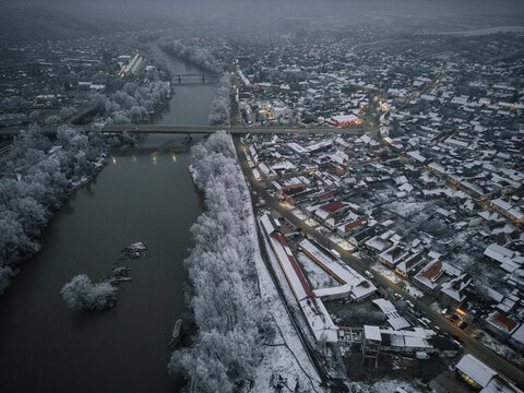 Drone's Embrace of Winter: A Breathtaking Aerial Portrait of Frozen Lakes and Enchanted Fores
