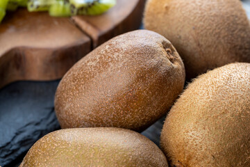yellow green kiwi with dark seeds, delicious kiwi