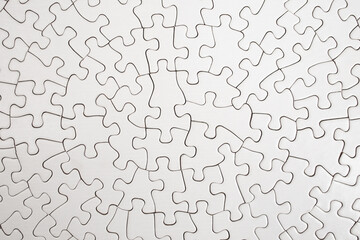 Plain white radial jigsaw puzzle solved, abstract texture close up backdrop