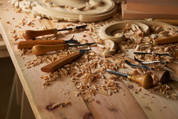 Carpenter's tools chisel. Wood carving equipment. Wooden table background