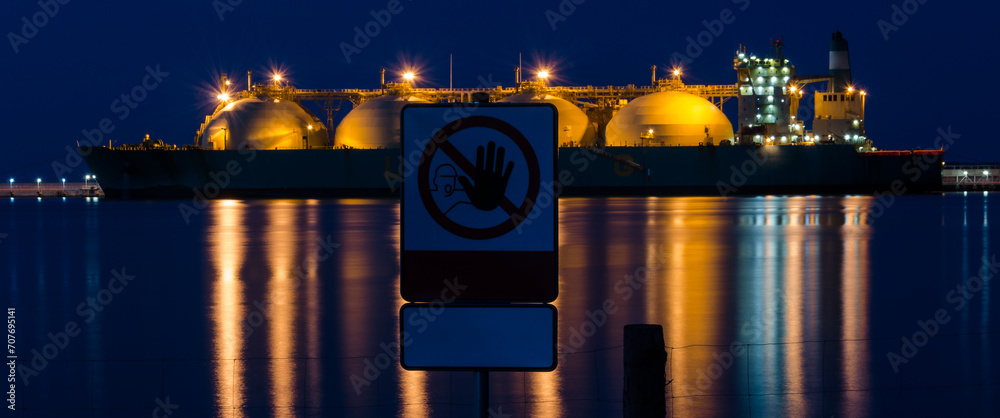 Wall mural LNG TANKER - Ship at night moored to the gas terminal