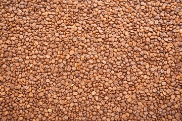 texture of whole roasted coffee beans heap