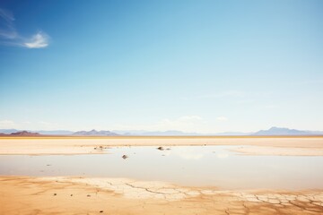 Fototapeta na wymiar desert mirage creating illusion of water in the distance