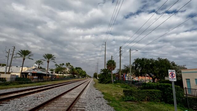 4k video of the railway tracks running through Delray Beach in Florida, USA