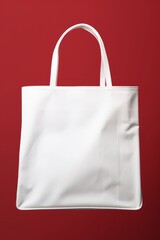 white tote bag isolated red background