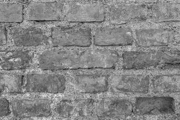 monochrome texture of old wall or pavement closeup, black and white gray background macro, wallpaper for design