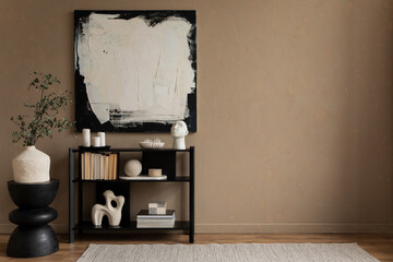 Minimalistic composition of living room interior with design shelf, stylish paintings, decorations,...