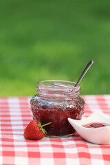 Jar of strawberry jam