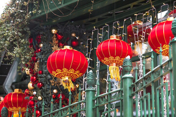 Chinese red Christmas lanterns on the street of the city. Close-up. Chinese New Year 2024.