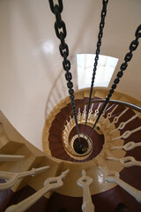 A spiral staircase within a lighthouse