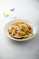 Homemade mushroom ravioli with basil