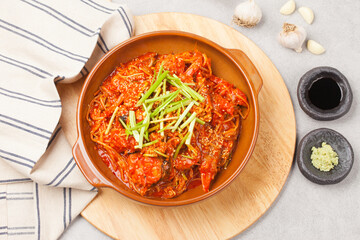 The representative menu items are steamed sea bass and lobster dishes.
