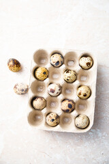 Healthy organic quail eggs in a box