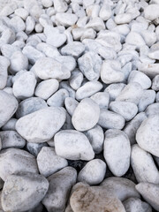 White gray pebbles stone background