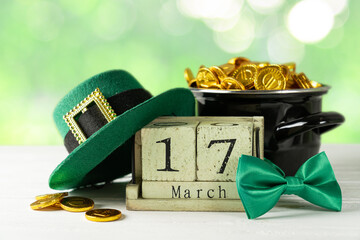 St Partick's day concept - pot of gold, calendar, hat