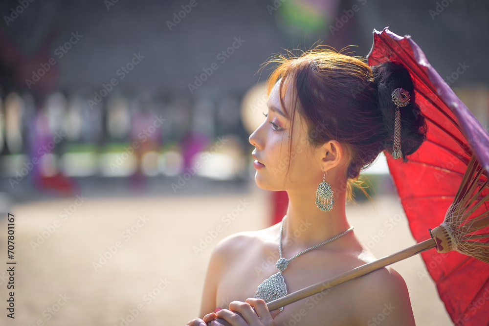 Wall mural pretty asian thai women in lanna dress traditional costume northern thai cultural costumes identity 