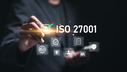 ISO 27001 concept. Businessman choose ISO 27001 for information security management system (ISMS). requirements, certification, management, standards.