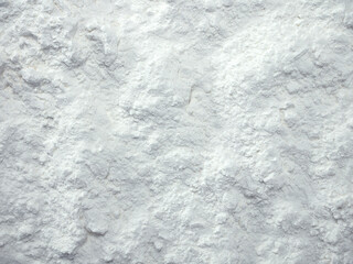 Obraz premium White flour texture background. Abstract powder texture. White powder surface with cracks.
