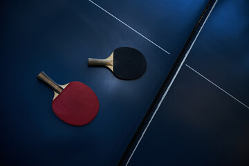 Table tennis rackets on table