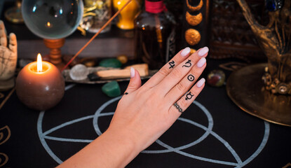 Meaning of rings on a finger. Esoteric and astrology symbol of ring. Scene with a ladies hand