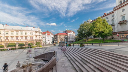 Obraz premium Panorama showing Sulkowski Castle and fountain on Chrobry Square in Bielsko-Biala timelapse, Poland.