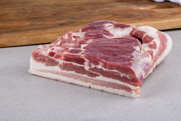 raw Porc bacon fresh on grey background 
