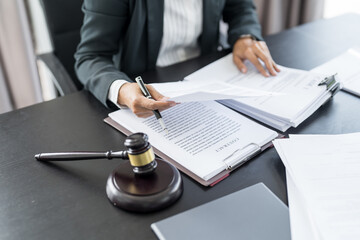 Lawyer businessman working with lawbook in office or courtroom Legal counsel with gavel and legal law. justice and lawyer concept Judge gavel hammer on Lawyer desk - obrazy, fototapety, plakaty