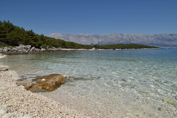 Rocky Beach In Summer | Adriatic Coast With Mountains