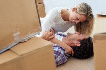 Couple, boxes and happy or excited for real estate, new home or property investment with romance or...