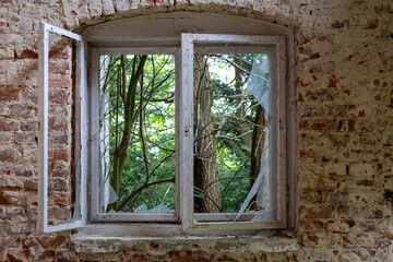 old wooden window in an abandoned house