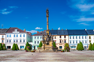 Fototapeta na wymiar The Main Square and the Plague Column built in 1717-1720 in the Moravian Trebova (Moravska Trebova), Moravia, Czech Republic