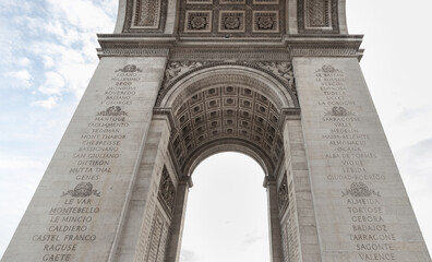A view from directly under the famous Arc de Triomphe. Detail under view of carvings under the arch...