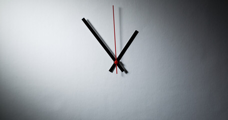 Abstract clock - modern clock hands showing time under dramatic light - 707864374