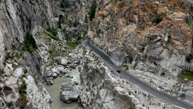 Aerial video of a road through the mountains