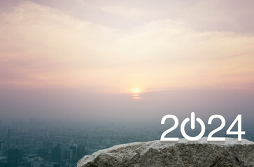 Fototapeta premium 2024 start up business flat icon on rock mountain over aerial view of cityscape at sunset, vintage style, Happy new year 2024 success concept