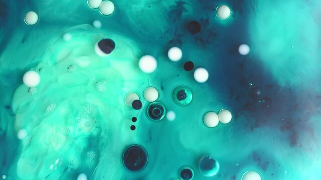 Abstract background of moving colorful liquid paint and bubbles. Colorful liquid bubbles. Beautiful liquid art 3D Abstract