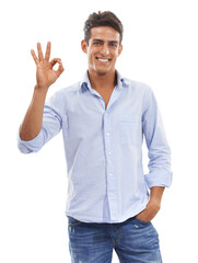 Fototapeta premium Success, okay sign and happy man in portrait for thank you, support or like on a white background. Young person or model in shirt and jeans with great, yes and excellence emoji or hand in studio