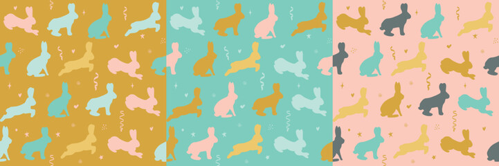 Blue, pink, orange rabbits seamless pattern collection. Multicolored running, jumping rabbits. Chinese zodiac symbol. Vector illustration