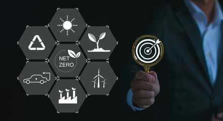 Target businessman working on virtual reality screen to reduce CO2 emissions, climate change to limit global warming. Sustainable development and innovative green business ideas 