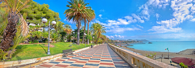 View of promenade along scenic seaside riviera in San Remo city. Liguria, Italy