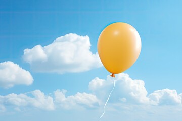 Obraz premium Food concept: Yellow balloon shaped like an egg, with white cloud on blue sky.