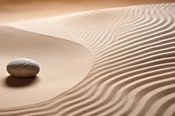 Fotobehang Stenen in het zand Zen garden with stones and sand for relaxation and balance in a spa or wellness setting.